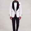 Front walking pose in a white damask tuxedo with solid black trousers and black dress shoes from Gentleman's Guru