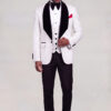 Full-body standing pose styling a white damask jacket with black velvet lapels and matching vest from Gentleman's Guru