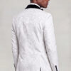 Rear view showing the white damask pattern and tailored jacket shape from Gentleman's Guru