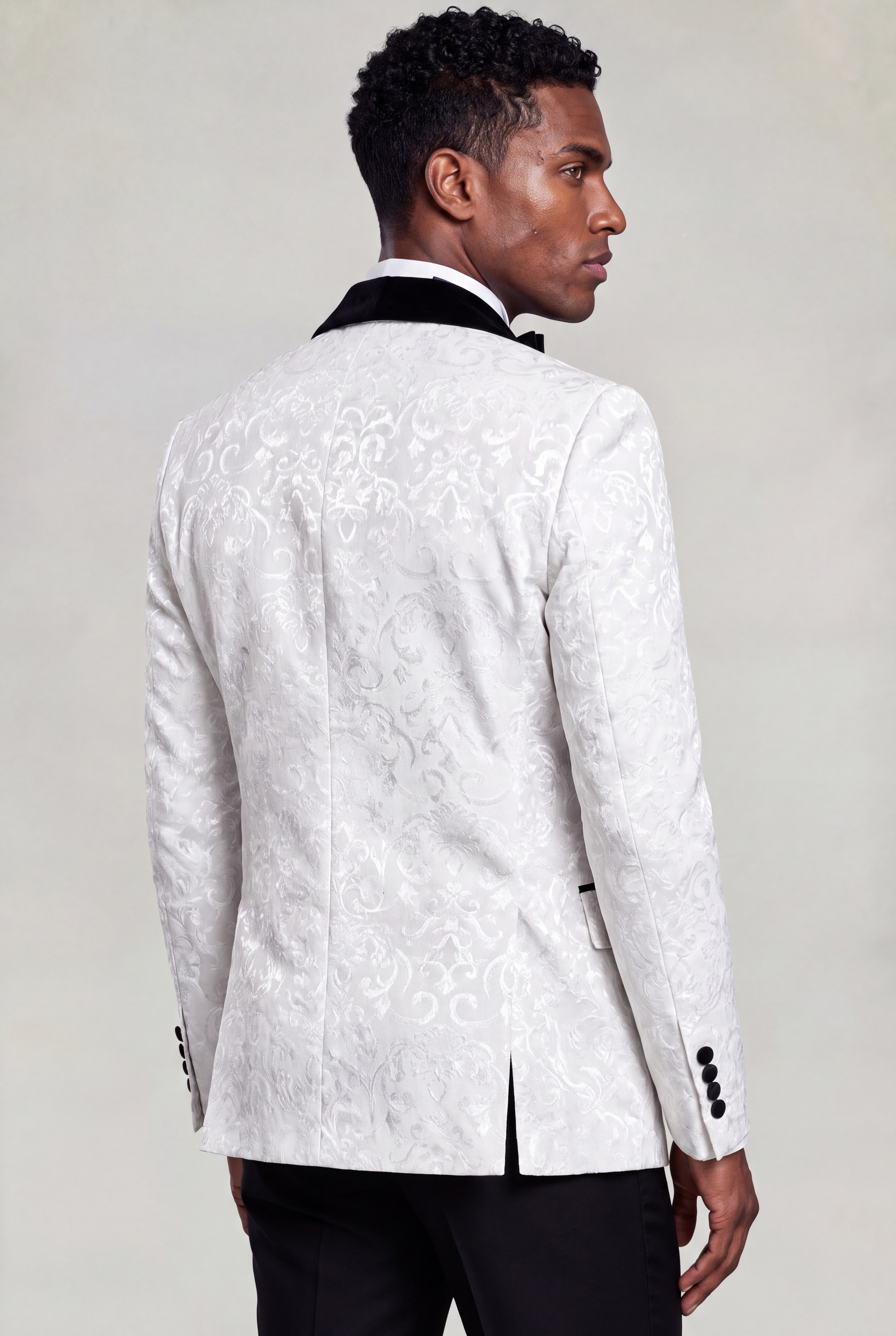 Rear view showing the white damask pattern and tailored jacket shape from Gentleman's Guru