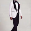 Full-length side walking view of a white damask jacket, four-button vest and black trousers from Gentleman's Guru