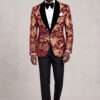 Burgundy and Gold Velvet Tuxedo Jacket full body walking with black trousers from Gentlemansguru.com