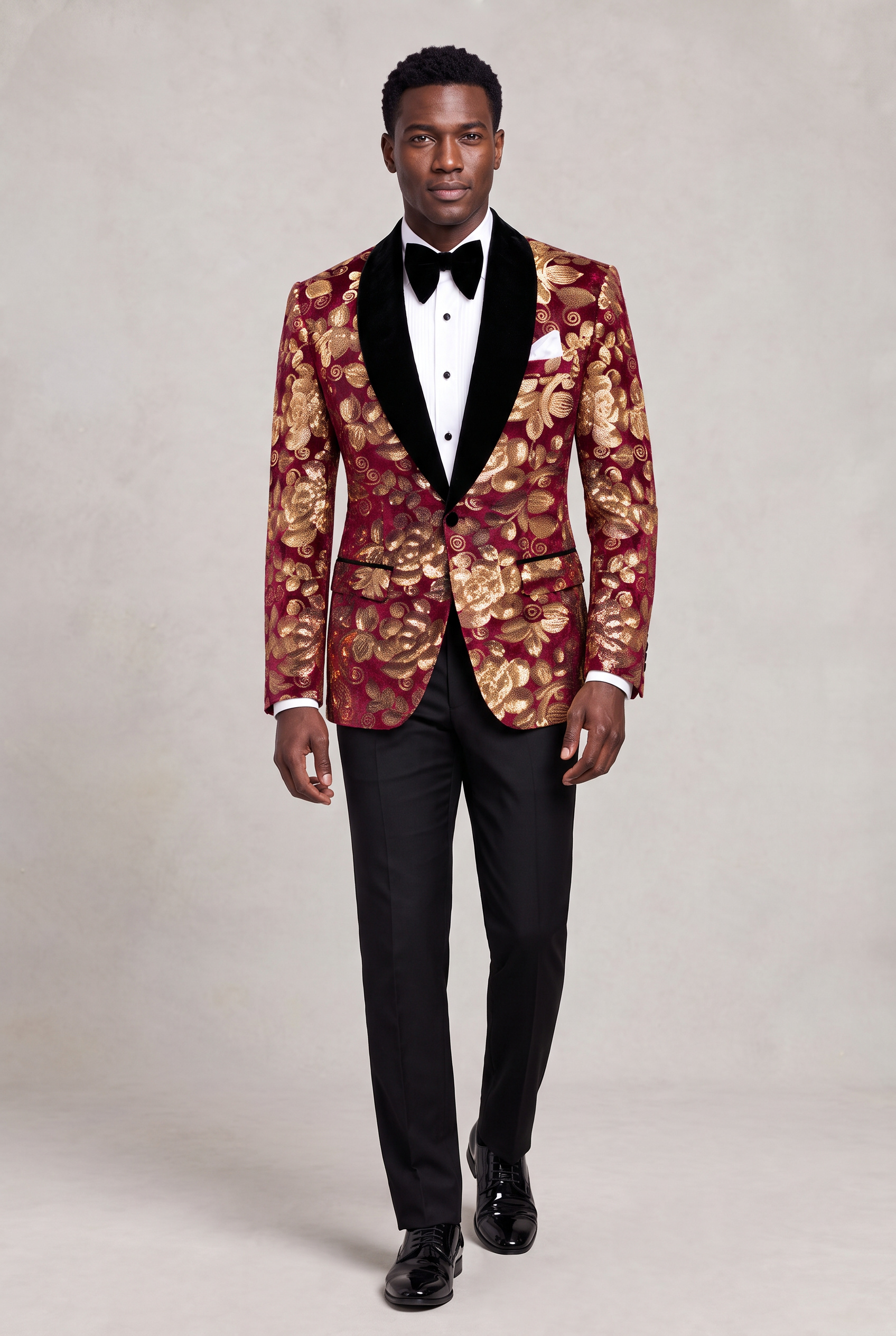 Burgundy and Gold Velvet Tuxedo Jacket full body walking with black trousers from Gentlemansguru.com