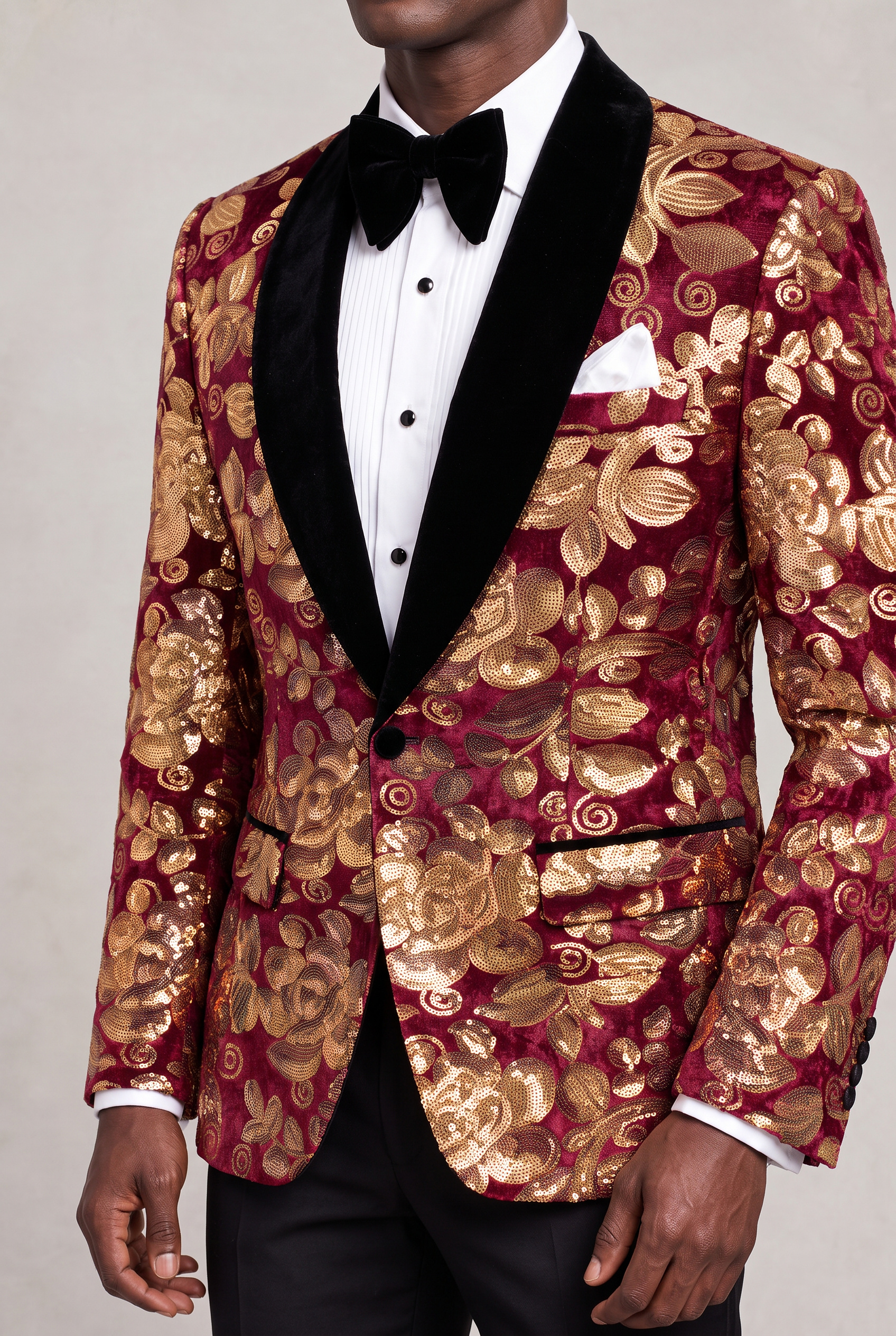 Burgundy and Gold Velvet Tuxedo Jacket close up of gold floral sequins black shawl lapel and white pocket square from Gentlemansguru.com