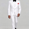 Front walking view of an all-white floral two-piece tuxedo with a black bow tie and black dress shoes from Gentleman's Guru