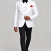 Full-length walking pose in a white floral shawl-lapel tuxedo jacket with black trousers and polished black dress shoes from Gentleman's Guru