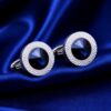 Designer round blue crystal cufflinks on cobalt silk
