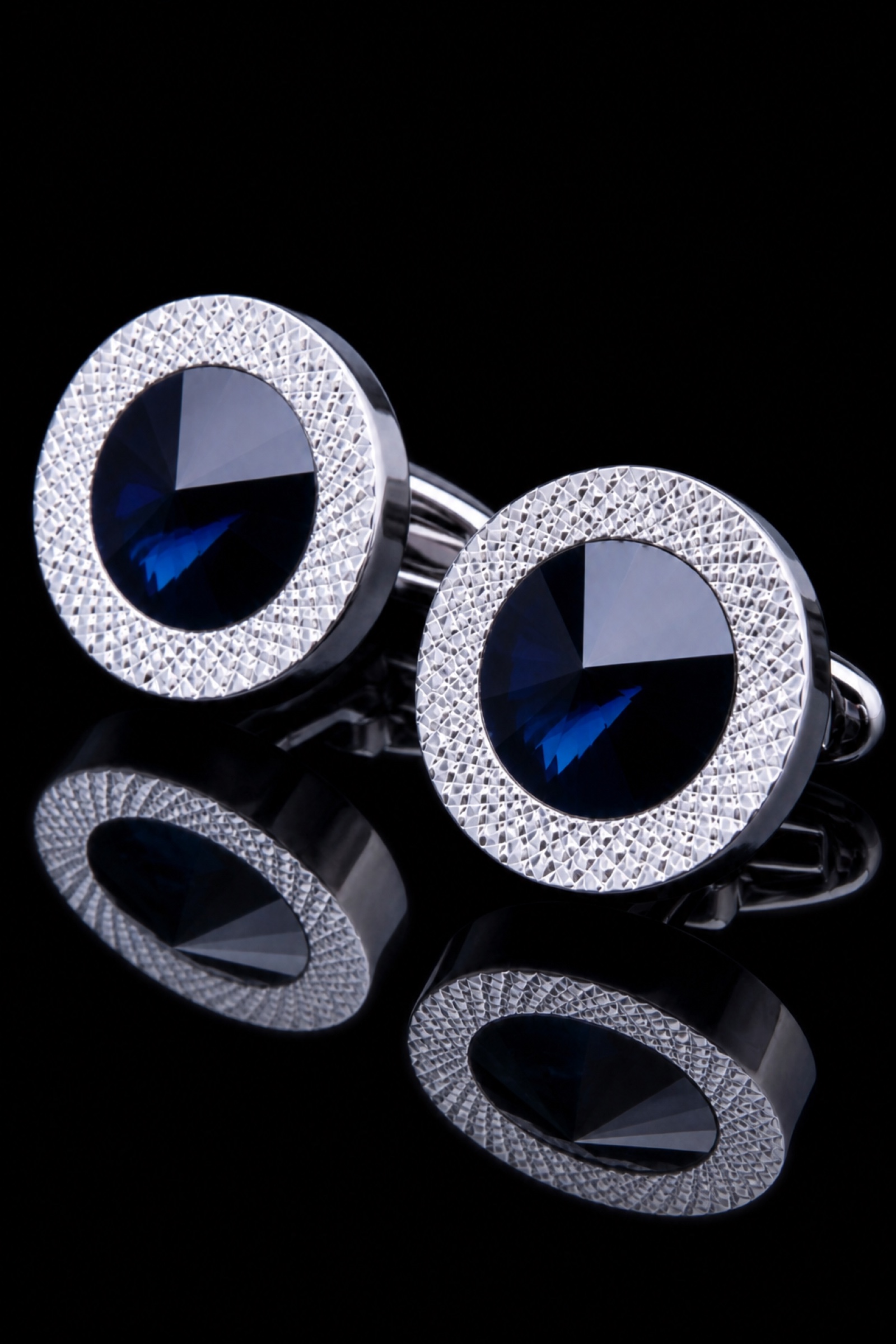 Men’s round blue crystal cufflinks with textured silver rims