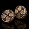 Ornate blue and gold cufflinks with crystal details