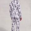 Rear three-quarter full-body view of a white and black floral formal suit with matching trousers from Gentleman's Guru