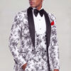 Side portrait of a white and black floral wedding suit with matching patterned trousers from Gentleman's Guru