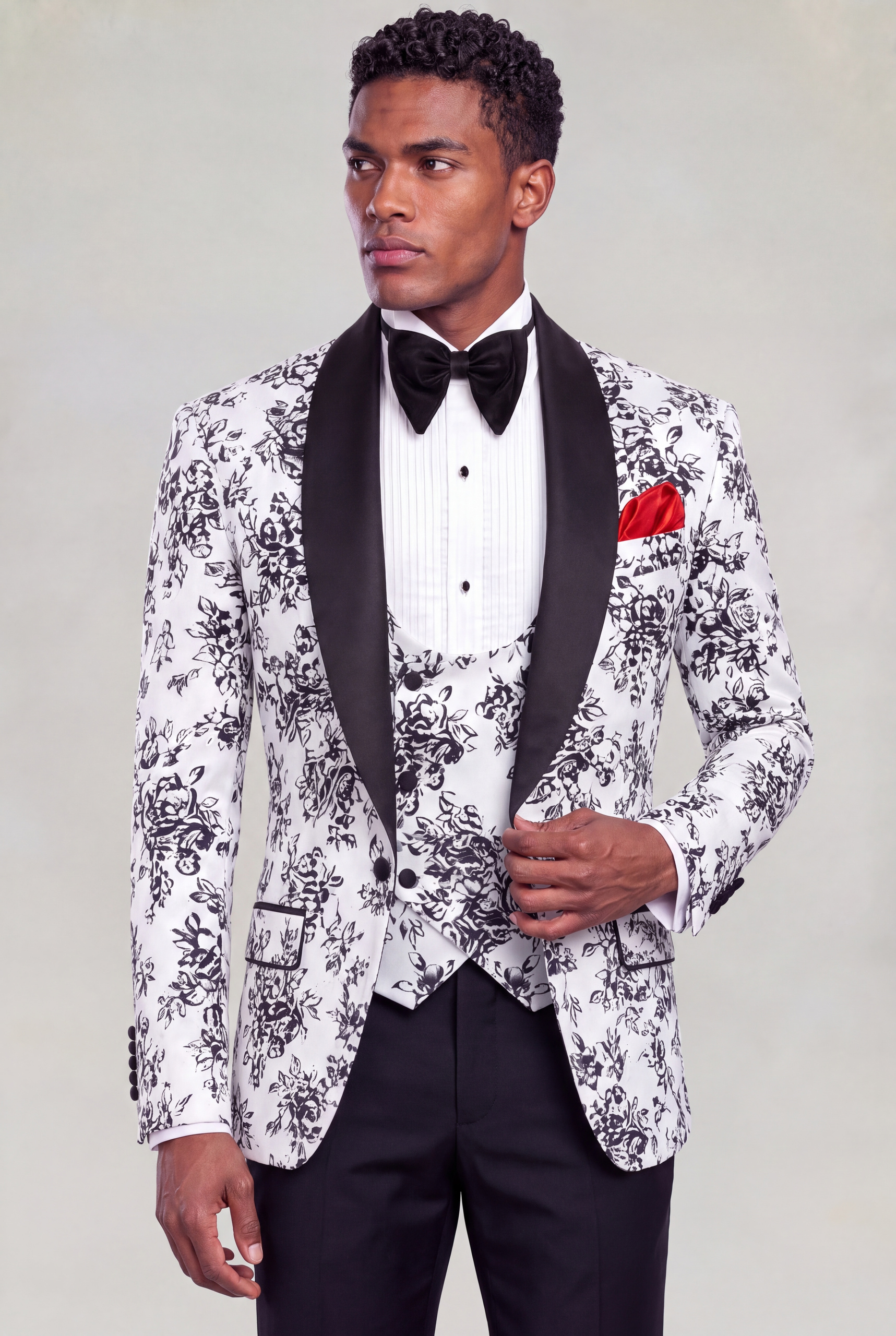 White and black floral tuxedo jacket and double-breasted vest styled with solid black trousers from Gentleman's Guru