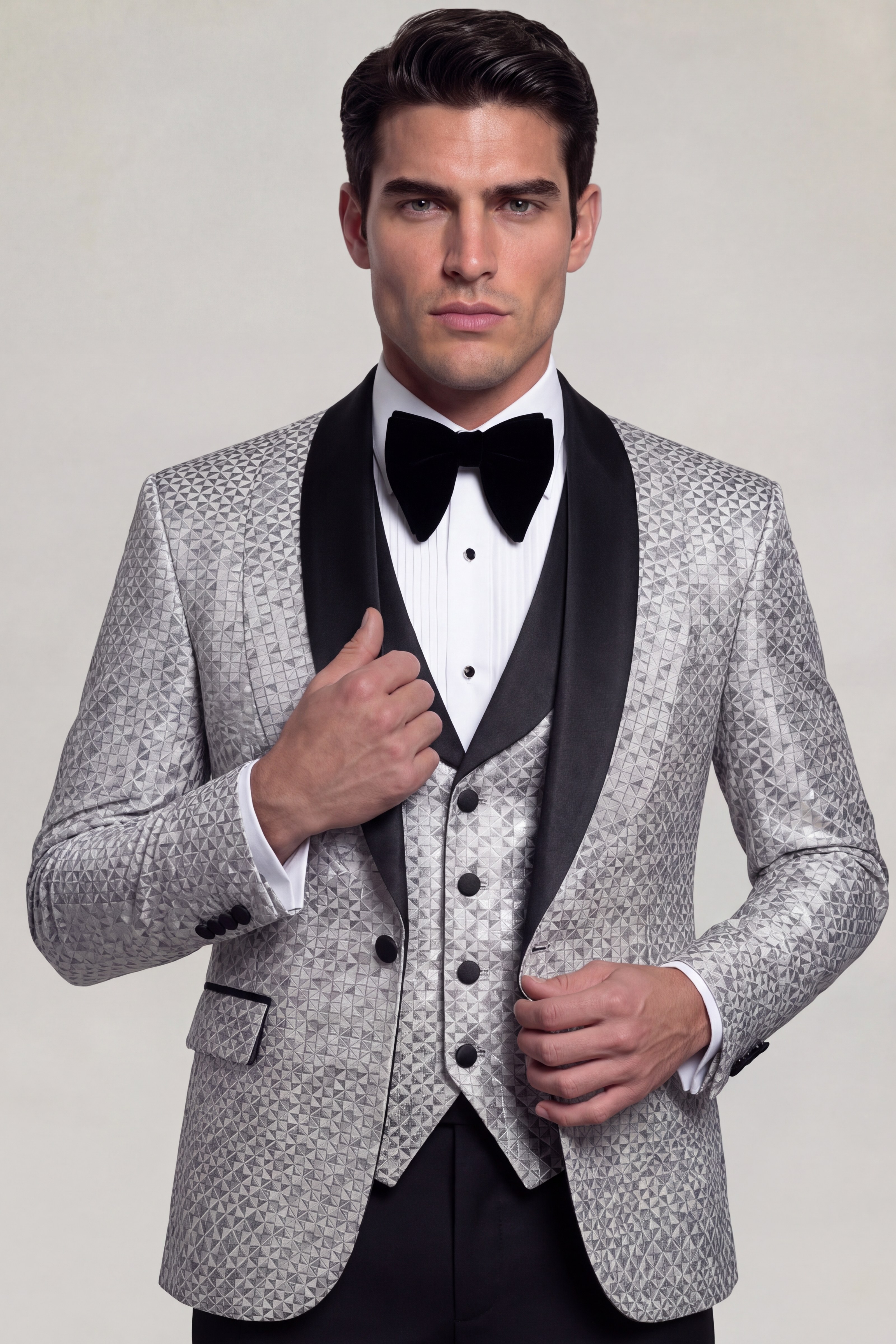 Man wearing a silver grey mosaic three-piece tuxedo with black trousers – thumbnail