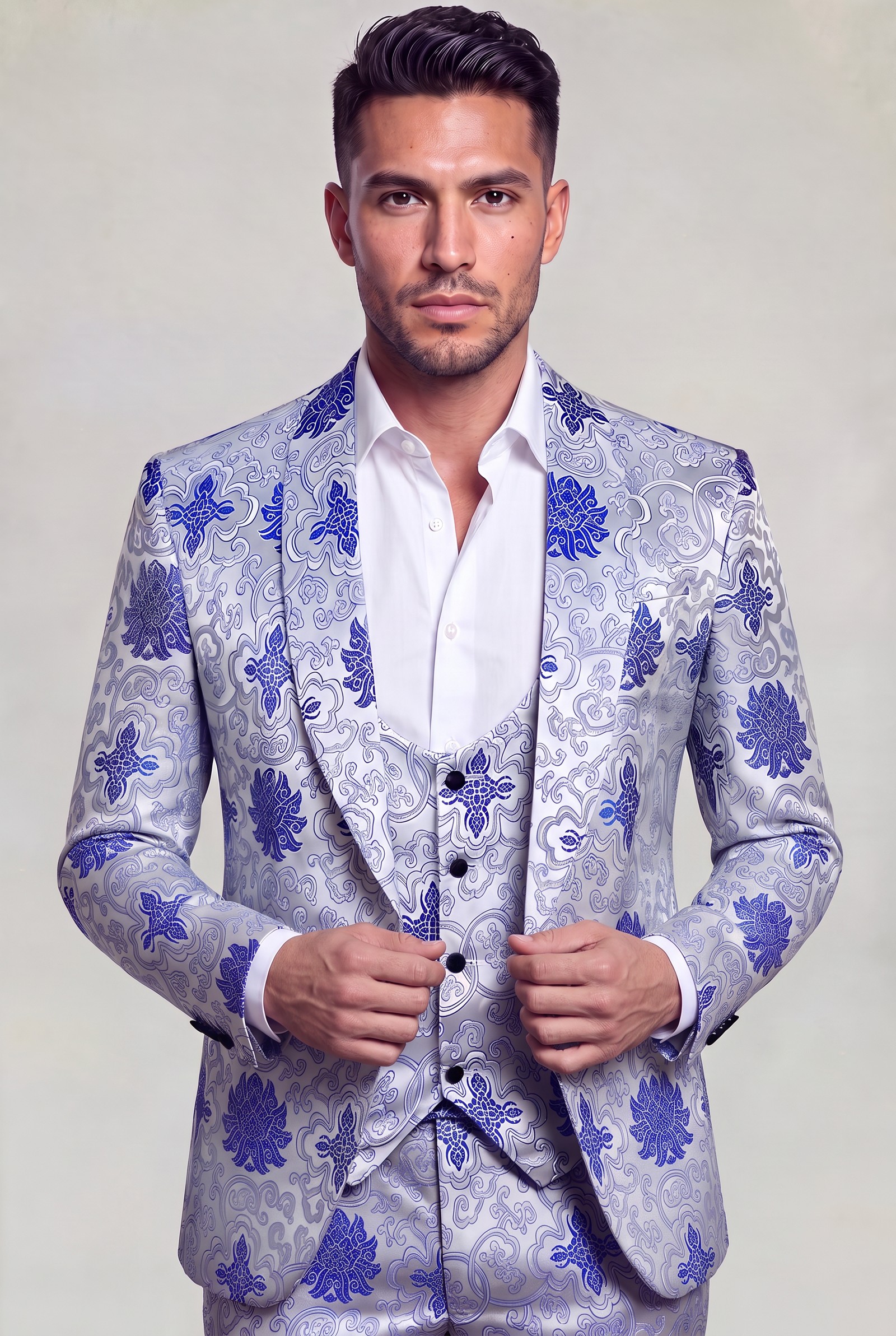 Silver and royal blue porcelain tuxedo jacket and four-button vest in a relaxed portrait
