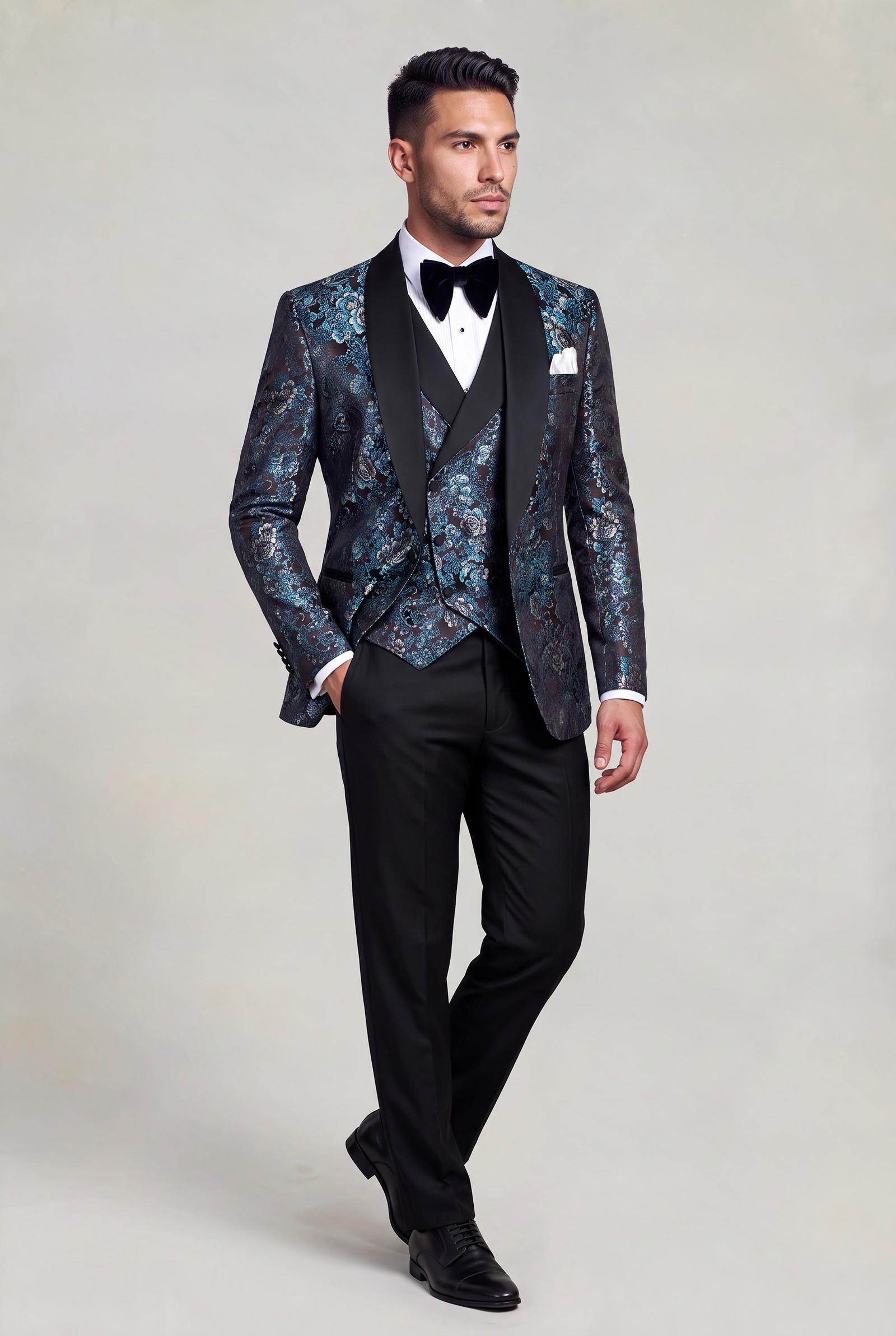 Floral tuxedo and plain trousers in a relaxed three-quarter pose