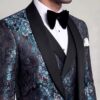 Close-up of floral tuxedo fabric, satin shawl lapel and white pocket square