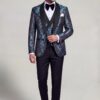 Mint green floral tuxedo in a natural full-length movement pose