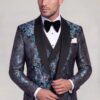 Mint green floral tuxedo jacket and matching waistcoat in a relaxed cuff pose