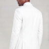 Rear three-quarter view of a plain white suit jacket showing its tailored shape from Gentleman's Guru