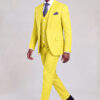 Side walking pose in a yellow suit with matching trousers and black dress shoes from Gentleman's Guru