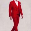 Red polka dot wedding suit with matching trousers in a side walking pose