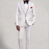 Full-body white polka dot suit with matching trousers, red pocket square and black shoes from Gentleman's Guru