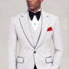 White polka dot jacket and matching vest styled with solid black trousers from Gentleman's Guru