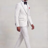 Side walking view of a white polka dot jacket, vest and matching trousers with black shoes from Gentleman's Guru