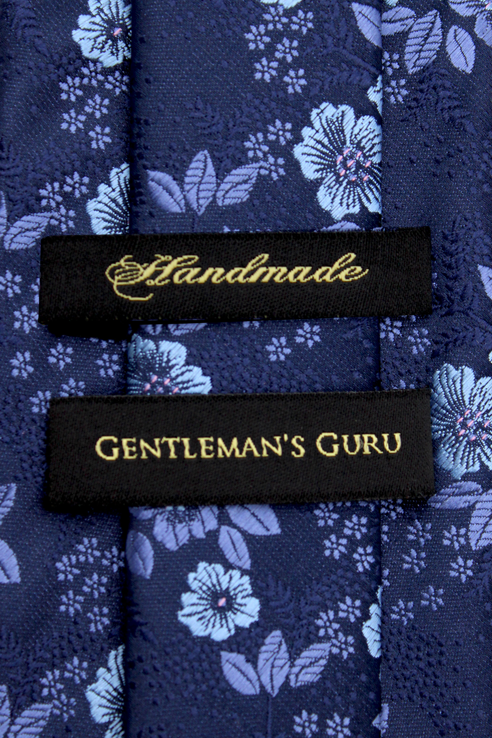 Blue-Floral-Branded-Tie-from-Gentlemansguru.com