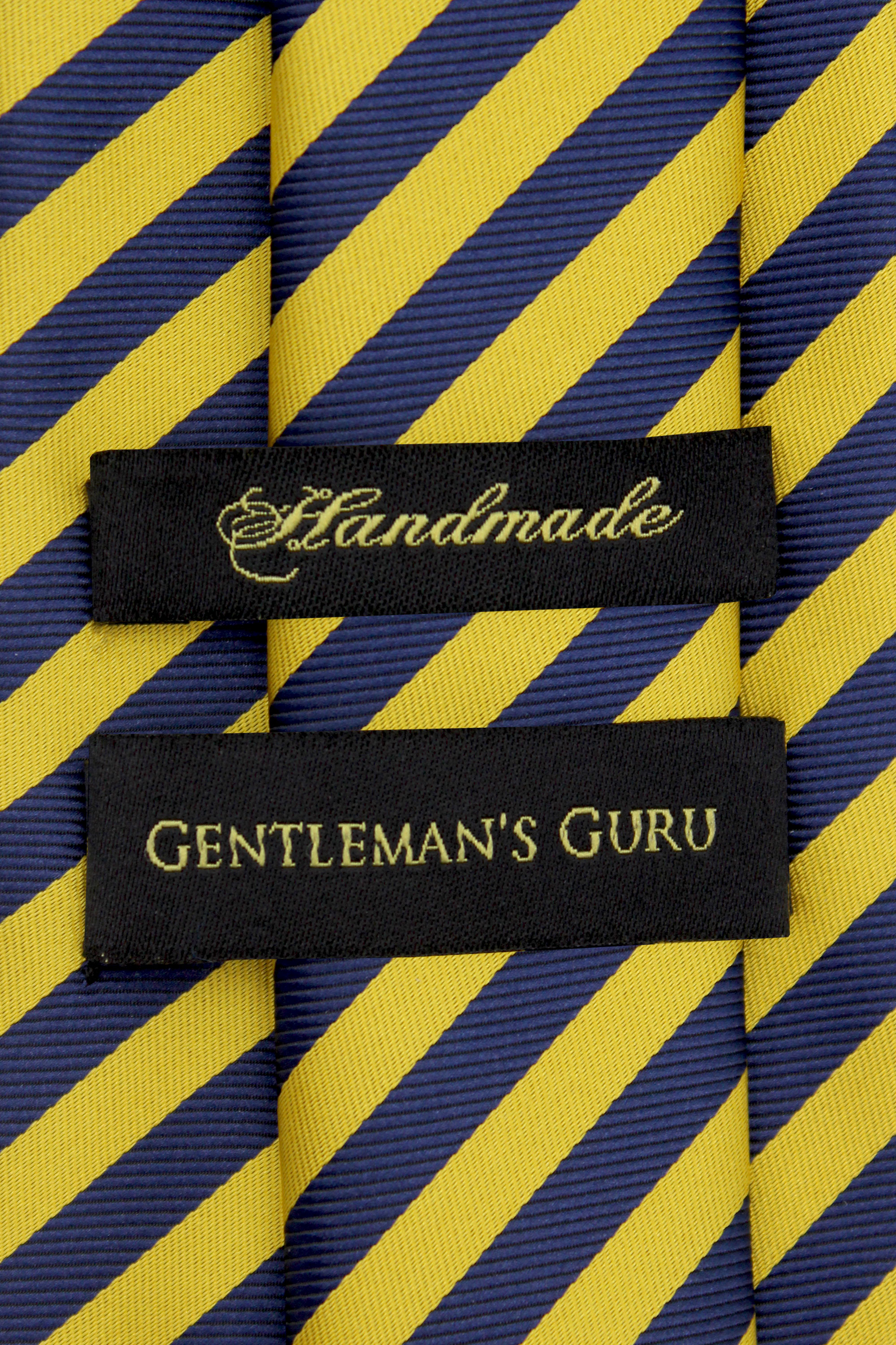 Gold-and-Navy-Blue-Striped-Branded-Tie-from-Gentlemansguru.com