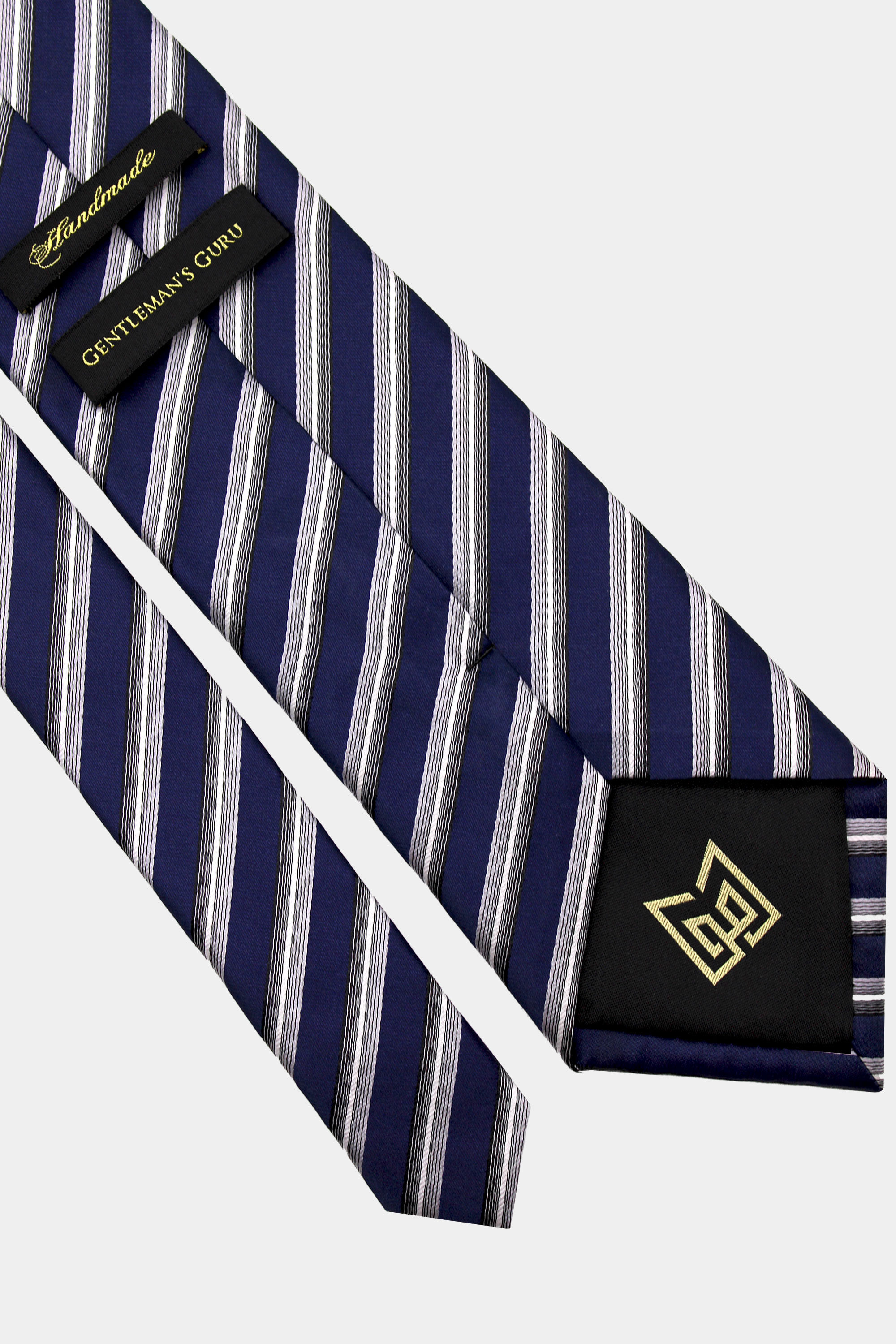 Grey-and-Navy-Blue-Striped-Tie-from-Gentlemansguru.com
