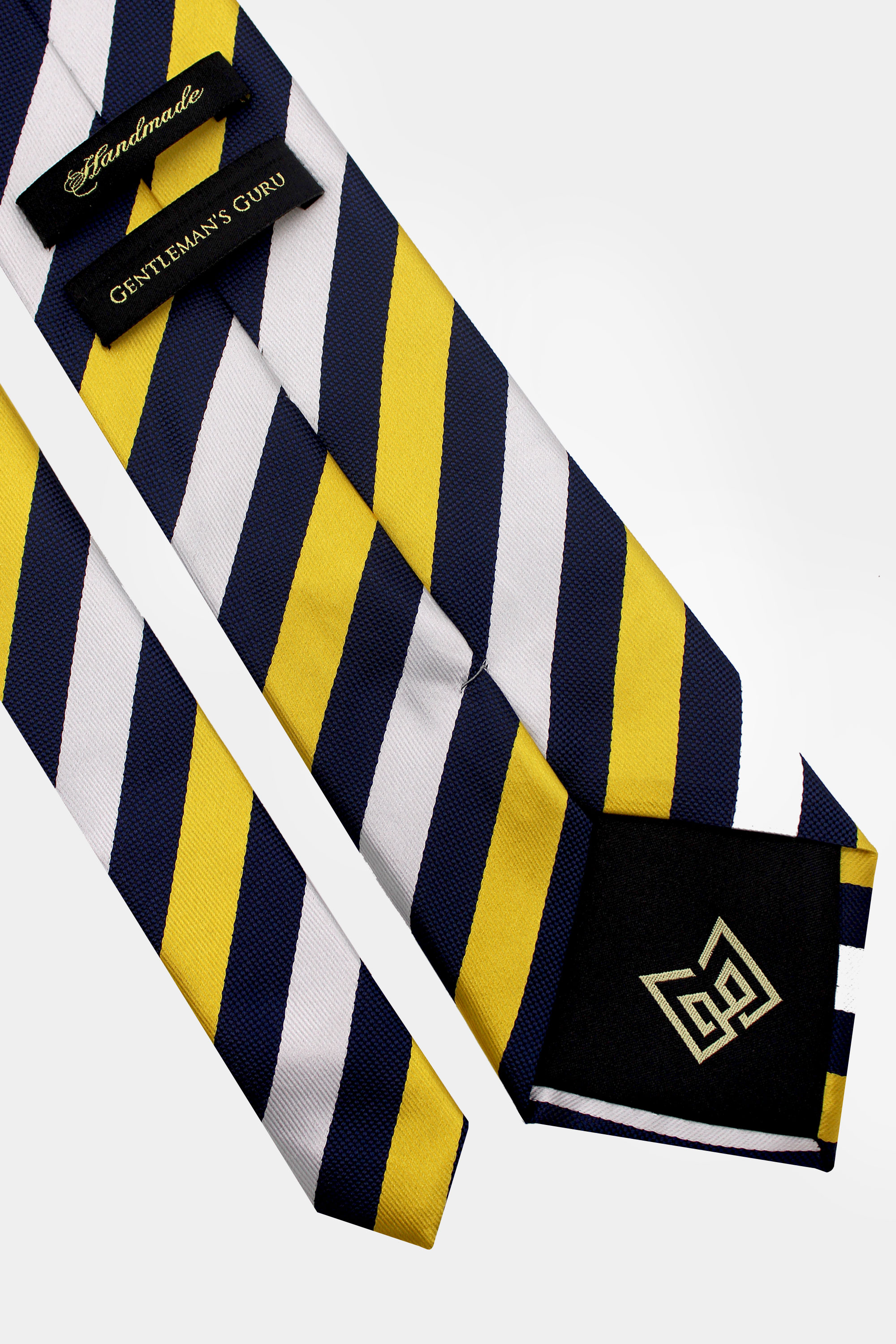 Navy-Blue-White-and-Gold-Striped-Tie-from-Gentlemansguru.com