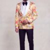 Peach floral double-breasted jacket with black dress trousers, full body