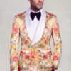 Peach floral tuxedo jacket paired with plain black trousers