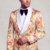 Peach floral tuxedo jacket with white lapels and matching trousers