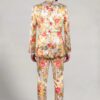 Rear full-length view of peach floral tuxedo with matching trousers