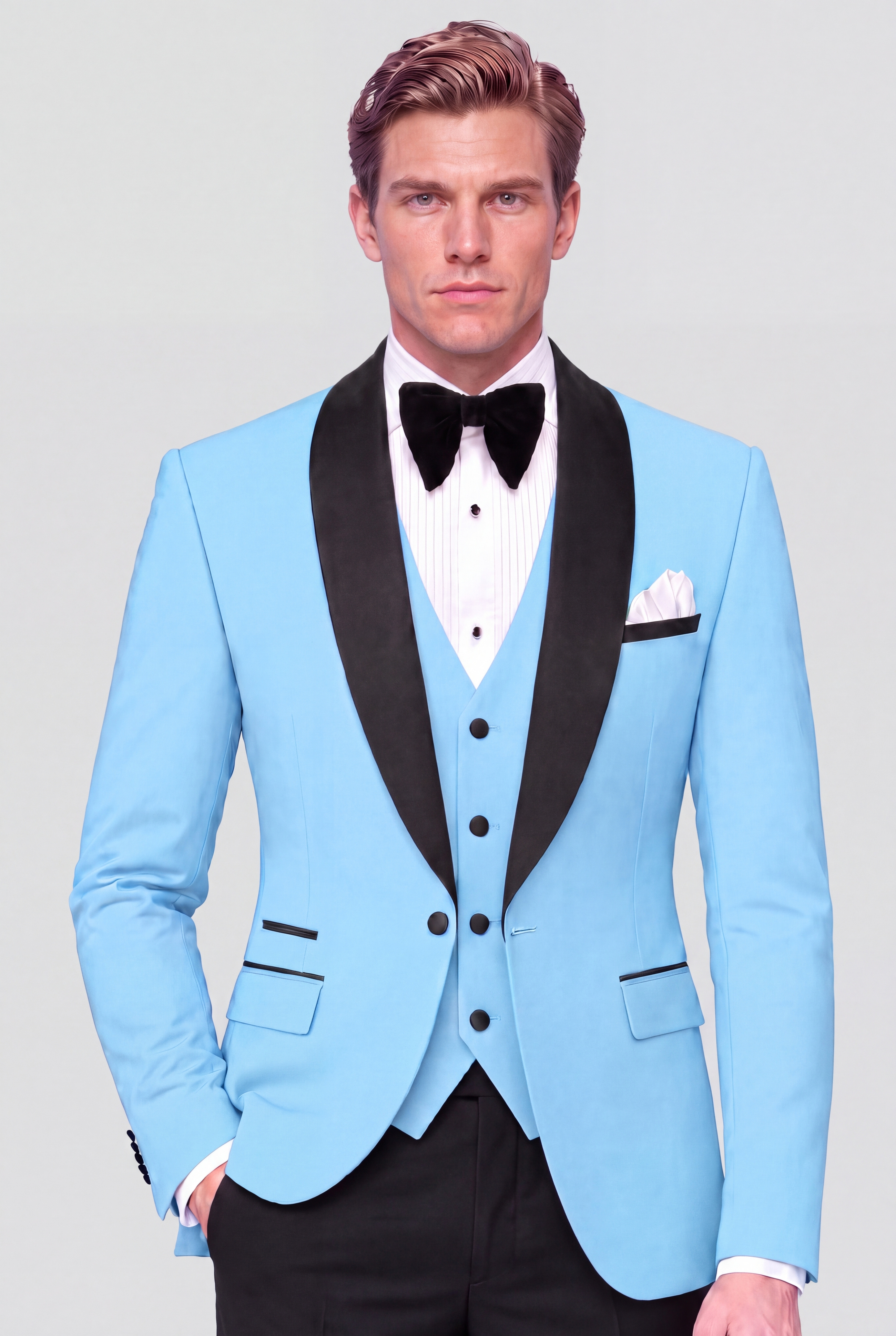 Front view of a baby blue three-piece tuxedo with black shawl lapels and black dress pants
