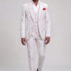 Full-length front walking pose in the rose gold abstract-print suit with matching trousers and black dress shoes from Gentleman's Guru