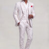 Full-body standing pose in a rose gold abstract-print three-piece suit with an open-collar shirt and red pocket square from Gentleman's Guru