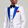 Three-quarter portrait showing royal blue satin lapels, white floral vest and red pocket square from Gentleman's Guru