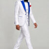 Full-length side walking pose in the white floral three-piece groom tuxedo with black formal shoes from Gentleman's Guru