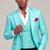 Turquoise floral wedding suit jacket and vest styled with black dress pants on a model | Gentleman’s Guru