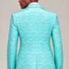 Rear view showing the floral pattern and fit of the turquoise suit jacket from Gentleman’s Guru