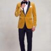 Full-body gold velvet formal jacket outfit with a black bow tie and black trousers