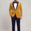 Full-length gold velvet tuxedo jacket outfit with black trousers and dress shoes
