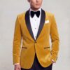 Gold velvet dinner jacket with black satin shawl lapels and black formal trousers