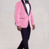 Full-body walking pose in a men's light pink velvet tuxedo jacket and black pants — Gentleman's Guru