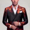 Cremon floral three-piece groom suit in a cuff-adjusting pose