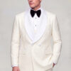 Three quarter view of a cream polka dot tuxedo with overlapping double breasted closure and matching trousers from Gentleman’s Guru