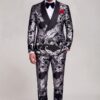 Full-length double-breasted black and silver tuxedo with matching paisley trousers